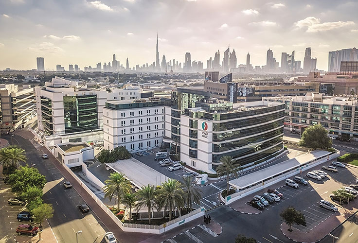 ENOC headquarters building with Dubai skyline in the background.
